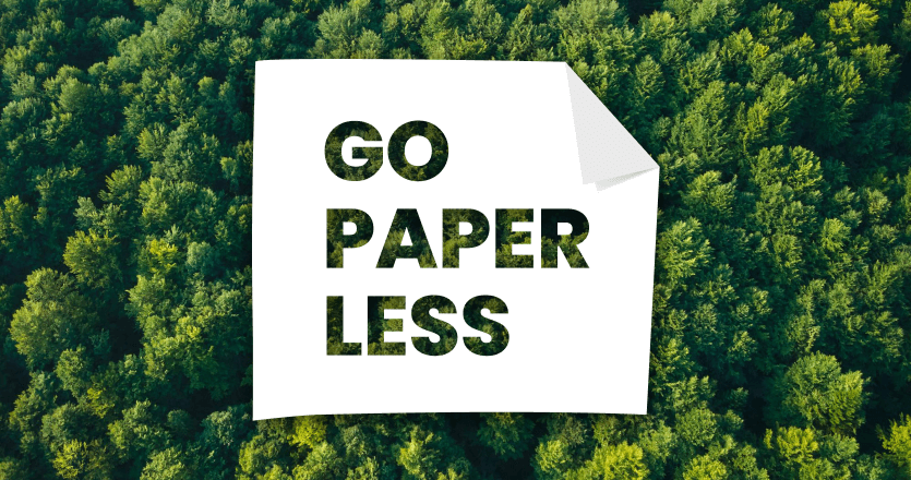 An aerial view of a green forest with the text "go paperless" on top