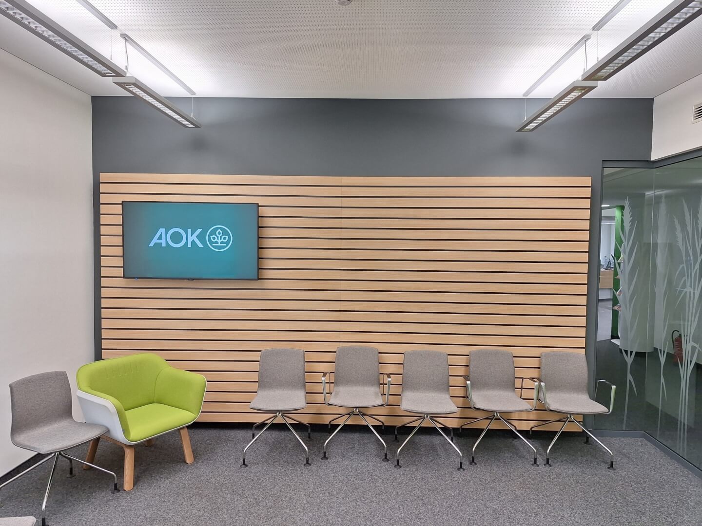digital signage display in an AOK office