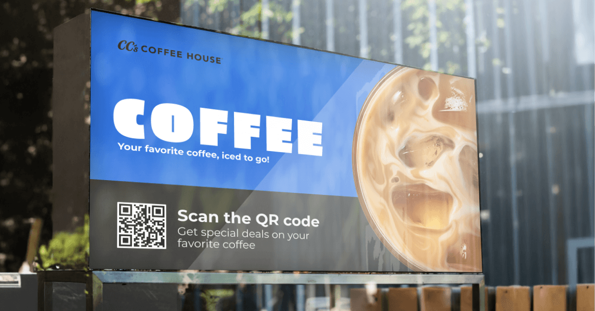 An outdoor digital signage screen showing coffee