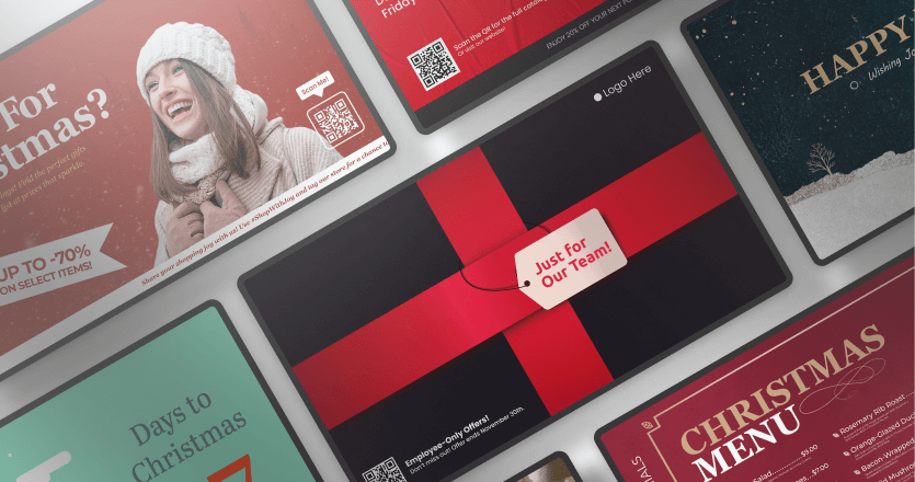 digital screens displaying Christmas promotional graphics
