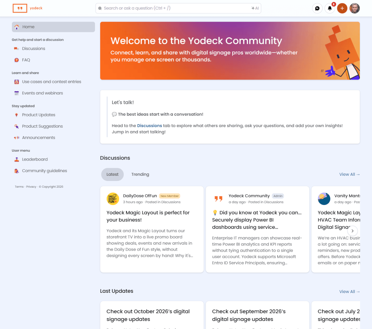 The Yodeck Community home page with the welcome banner, the latest discussions and the latest product updates.